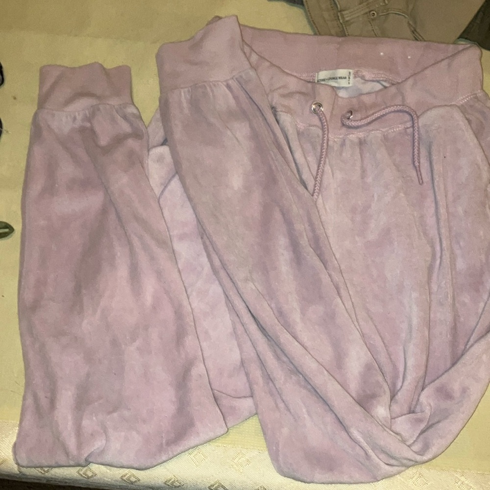 Pink jogger/ track suit pants. Says goddess on the back